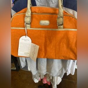 Jessica Simpson spoonful of sugar solid boarding tote. NWT. Perfect for travel